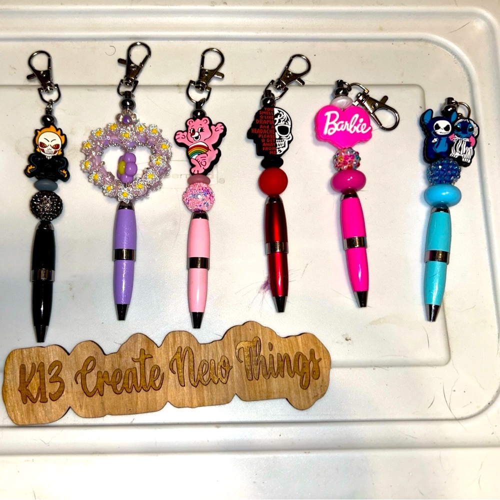 Hand crafted pens and badge reels